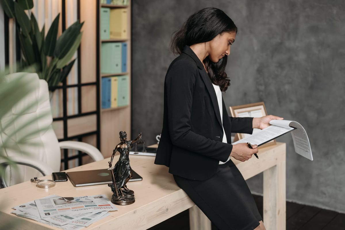 Experienced collection attorney reviewing a litigation-ready file